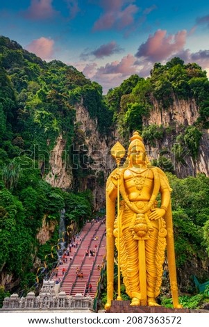 Statue of Lord Muragan and entrance at Batu Caves in Kuala Lumpur, Malaysia. Royalty-Free Stock Photo #2087363572