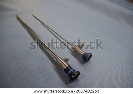 two different endoscopic optics are next to each other 