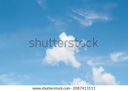 Bright blue sky and white cloudy for background.