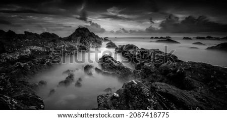 Long exposure seascape in black and white. located at Terengganu, Malaysia. panoramic photography . soft and grain effect. 