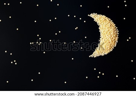 a starry sky and a new moon made of paste in the form of stars. Children's creativity, healthy food for children concept