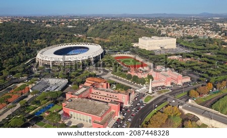 Aerial drone photo of iconic Foro Italico a Roman inspired sports facility park featuring soccer, tennis and swimming as sports available, Rome, Italy Royalty-Free Stock Photo #2087448328