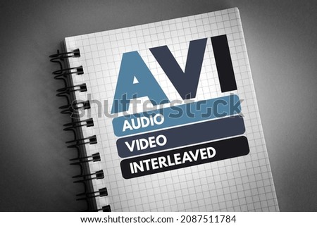 AVI - Audio Video Interleaved acronym on notepad, technology concept background