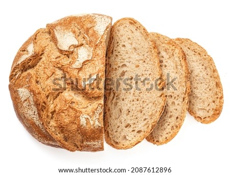 Freshly baked round  Bread isolated on white background.  Sliced, cutted wheat bread. Bakery, rustic  traditional food concept. Top view Royalty-Free Stock Photo #2087612896