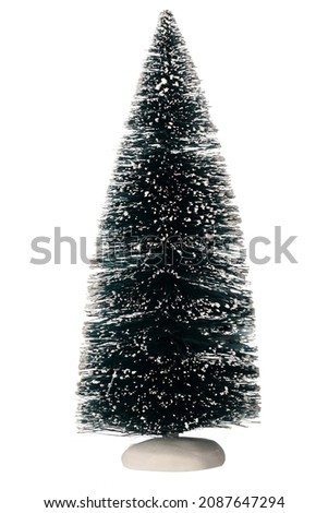Decorative Christmas tree covered with artificial snow, isolated on a white background.