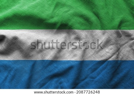 Close up of the Sierra Leone flag. Sierra Leone flag of background. flag symbols of Sierra Leonian.
