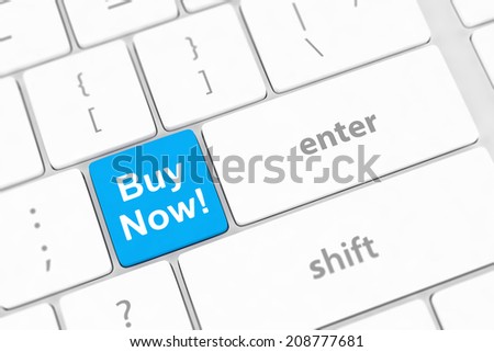 Buy now key on a white keyboard