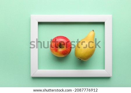 White frame on a green background, top view. Minimalism. Business plan, planning for the month. Place for the image. Eco consept