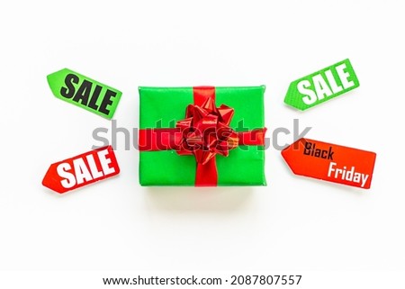 Sale label tag with gift box. Discount shopping day concept