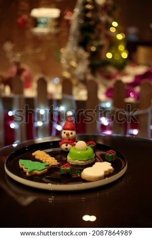 New year Christmas concept, pine tree, various gifts, colorful ornaments and objects. Out of focus background