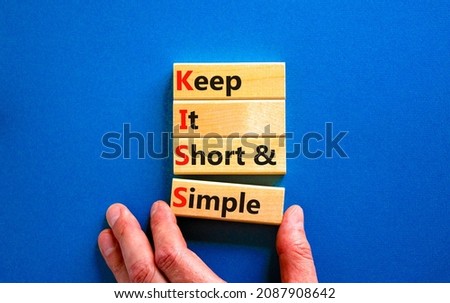 KISS keep it short and simple symbol. Concept words KISS keep it short and simple wooden blocks. Beautiful blue table, blue background. Business KISS keep it short and simple concept. Copy space. Royalty-Free Stock Photo #2087908642