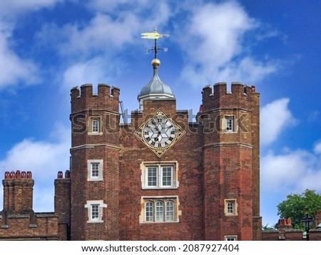 Close-up view of the tower of St. James Palace, with the clock and weather vane Royalty-Free Stock Photo #2087927404