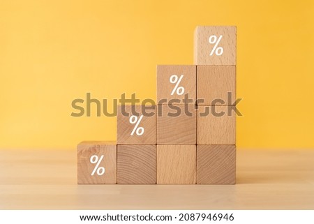 Wooden blocks with percentage signs.