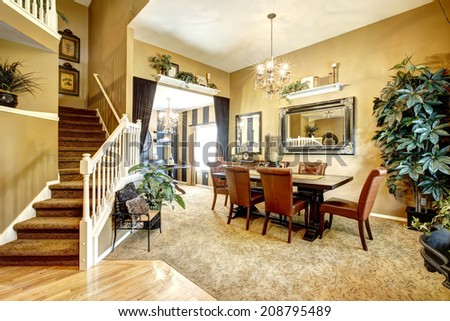 House with open floor plan. View of dining table  and wine tasting area