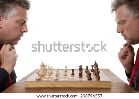man playing chess against himself shot in the studio