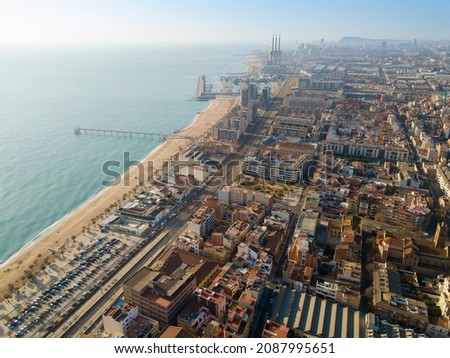 Aerial panoramic view of modern Badalona cityscape on Mediterranean coast, Spain.. Royalty-Free Stock Photo #2087995651