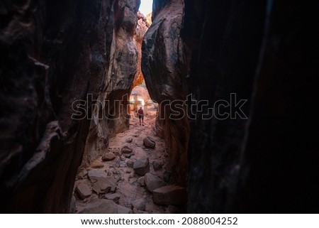 Slot canyon in Grand Staircase Escalante National park, Utah, USA. Unusual colorful sandstone formations in deserts of Utah are popular destination for hikers. Royalty-Free Stock Photo #2088004252