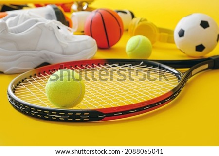 Set of sport equipment on color background