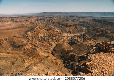 rocky terrain of Fish River Canyon in Namibia by dry season Royalty-Free Stock Photo #2088077206