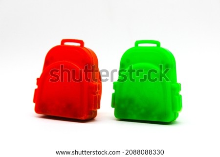 Toy bags on white background with selective focus