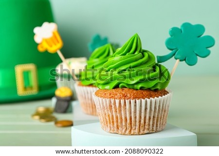 Tasty cupcake for St. Patrick's Day on table