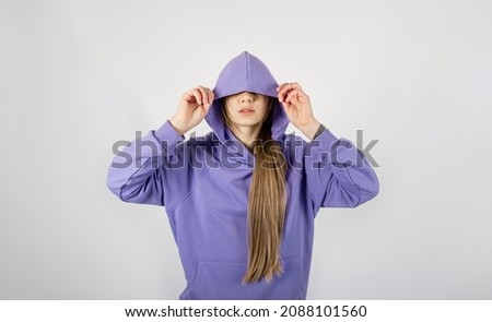Color of year 2022. Full length portrait of young sporty fitness women in lilac trendy cotton hooded sweatsuit. studio shot of blonde Hoody woman Royalty-Free Stock Photo #2088101560