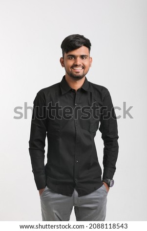 Young indian college student showing expression on white background.