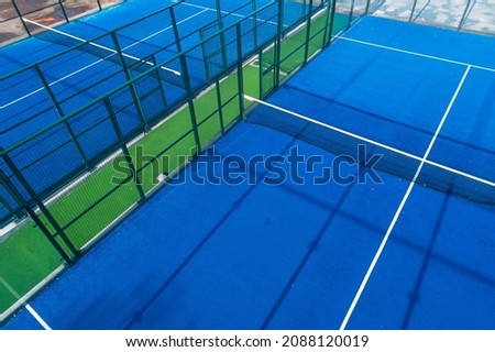 Aerial view with drone, overhead shot of a paddle tennis courts. Racket sports concept Royalty-Free Stock Photo #2088120019