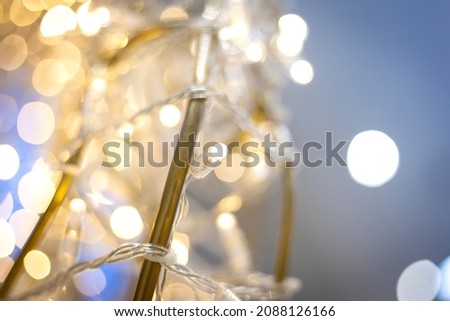 snow christmas tree decorated with silver and golden Christmas toys, christmas atmosphere,festive mood, decoration of shops before the new year and Christmas, new Year decorations, photo zone
