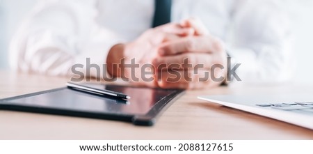 E-signature stylus and pad on business office desk, hands of a businessman in background, panoramic image with selective focus Royalty-Free Stock Photo #2088127615
