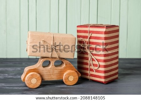Kid toy with gifts on table
