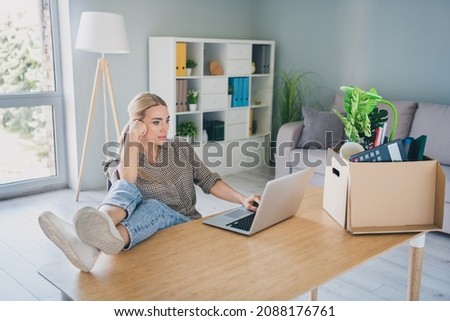 Photo of nervous specialist marketer lady sit desk use netbook wait hr recruiter answer in modern workspace