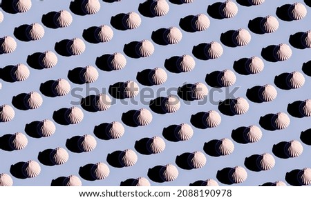 White Zephyr Flat Lay Colorful Pattern on Seamless Blue Background as Concept For Food Or Wallpaper Top View. Horizontal Image Orientation