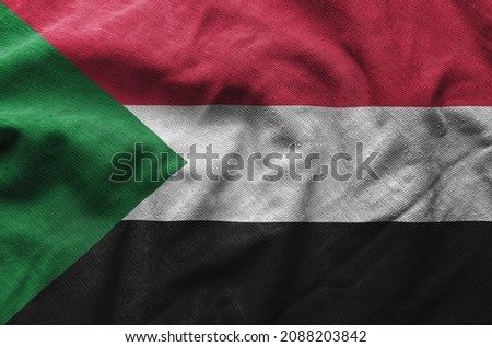 Close up of the Sudan flag. Sudan flag of background. flag symbols of Sudanese. Royalty-Free Stock Photo #2088203842