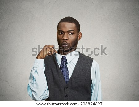 Closeup portrait, young business Man opening shirt to vent, it's hot, Unpleasant, Awkward Situation, Embarrassment. Isolated black, grey background. Negative Emotions, Facial Expression, Feelings Royalty-Free Stock Photo #208824697
