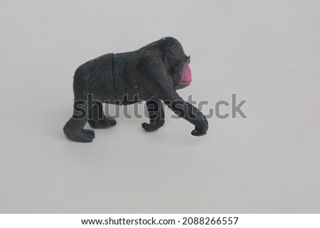 chimpanzee small toy made of plastic photo