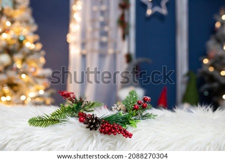 Christmas wreath on white fur. Christmas decor homemade