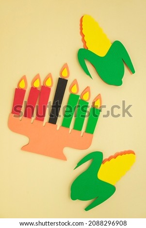 Happy Kwanzaa Greeting Card Background. Candleholder made from paper leaves. Paper art concept, Banner mockup