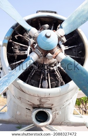 Old airplane engine close up. Radial engine of an propeller aircraft. Propellers on the nose of the aircraft. Royalty-Free Stock Photo #2088327472