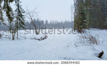 Winter landscape, ski track. High elevation mountains under snow in the winter