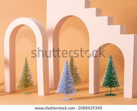 4 Christmas trees in a row under the arches, abstract Christmas background, Christmas, minimalism.
