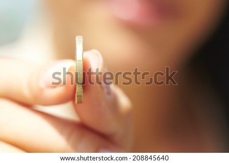 woman handing coins