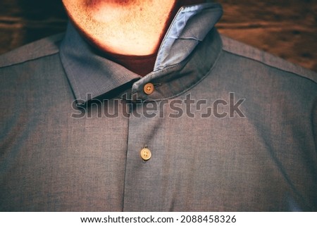 Closeup of a man with no tie