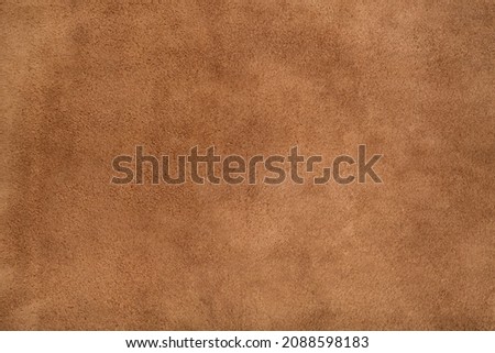 Brown suede leather texture background, genuine leather, top view. Suede texture - skin animal. Texture for design. Can be used as background wallpaper and background for design-works. Royalty-Free Stock Photo #2088598183