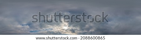 Overcast sky panorama on sunset with Cumulus clouds in Seamless spherical equirectangular format as full zenith for use in 3D graphics, game and aerial drone 360 degree panoramas for sky replacement. Royalty-Free Stock Photo #2088600865