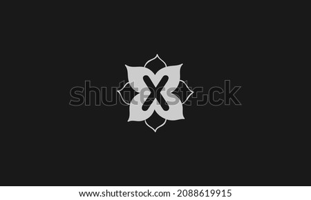 The letter X icon design inside a flower