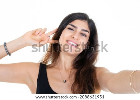 young girl happy beautiful smiling woman taking a selfie with phone cell