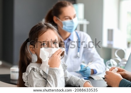 Little girl and her father visiting allergist in clinic Royalty-Free Stock Photo #2088633535