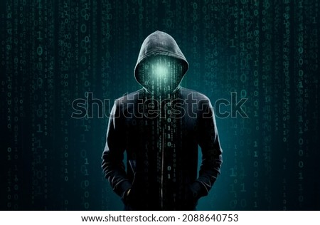 Computer hacker in hoodie. Obscured dark face. Data thief, internet fraud, darknet and cyber security concept. Royalty-Free Stock Photo #2088640753