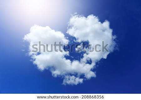 The heart shaped clouds on blue sky
